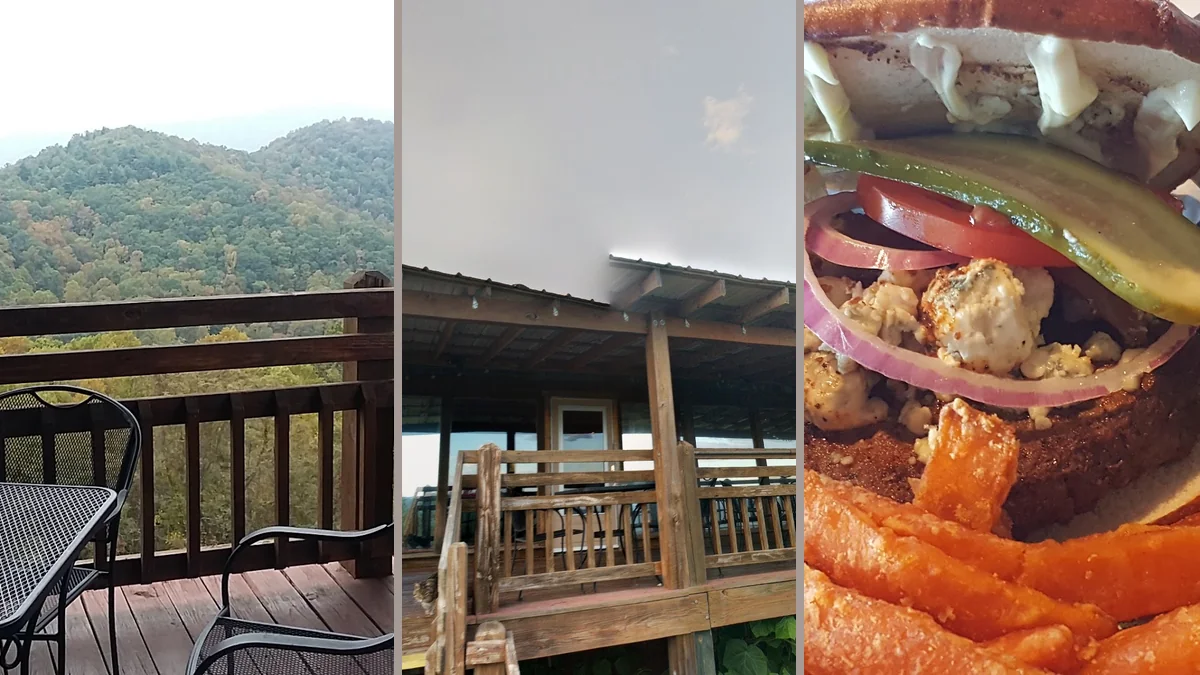 Restaurant deck seating beside wide mountain views.