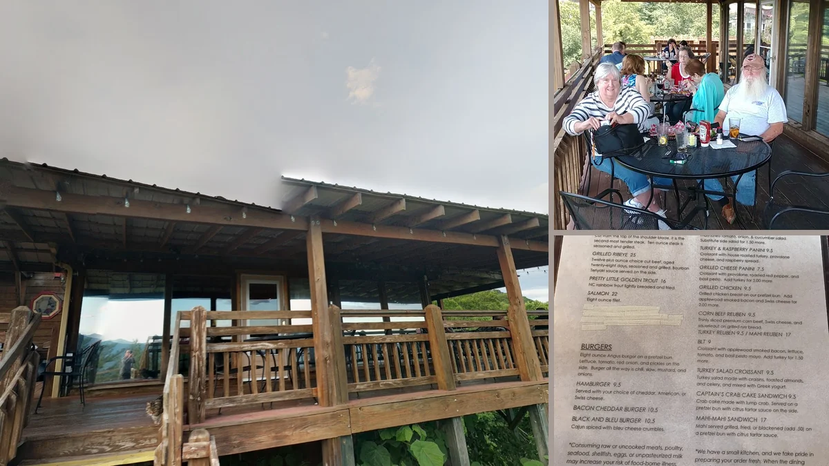 Restaurant deck seating beside wide mountain views.