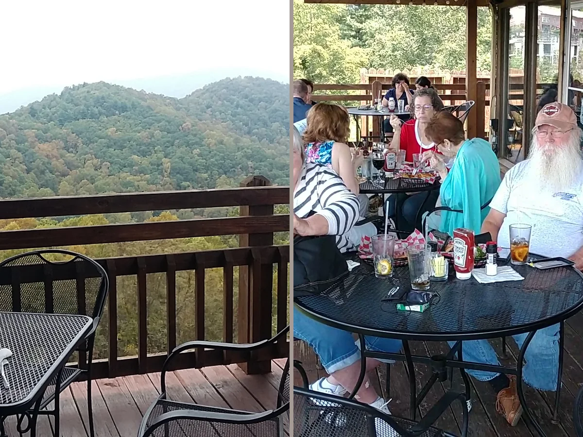 Restaurant deck seating beside wide mountain views.